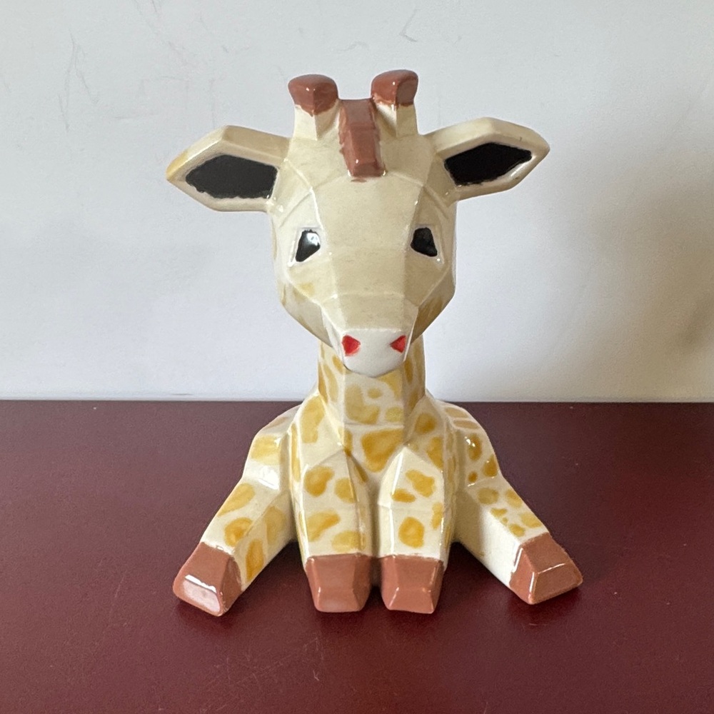 Giraffe Facet-ini, a ceramic bisque figurine with a geometric, faceted design